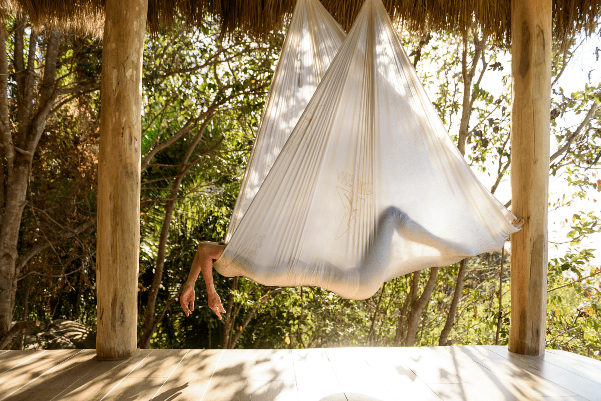 5 reasons why your next yoga retreat should include aerial yoga classes