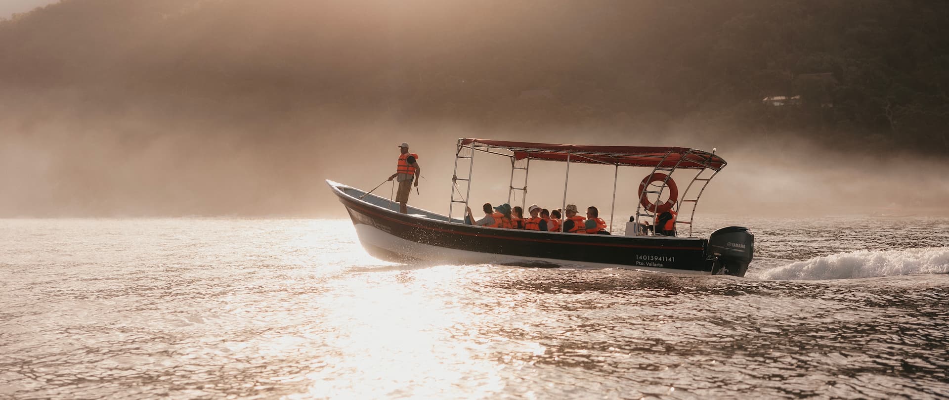 Arriving by boat on the waters of Banderas Bay